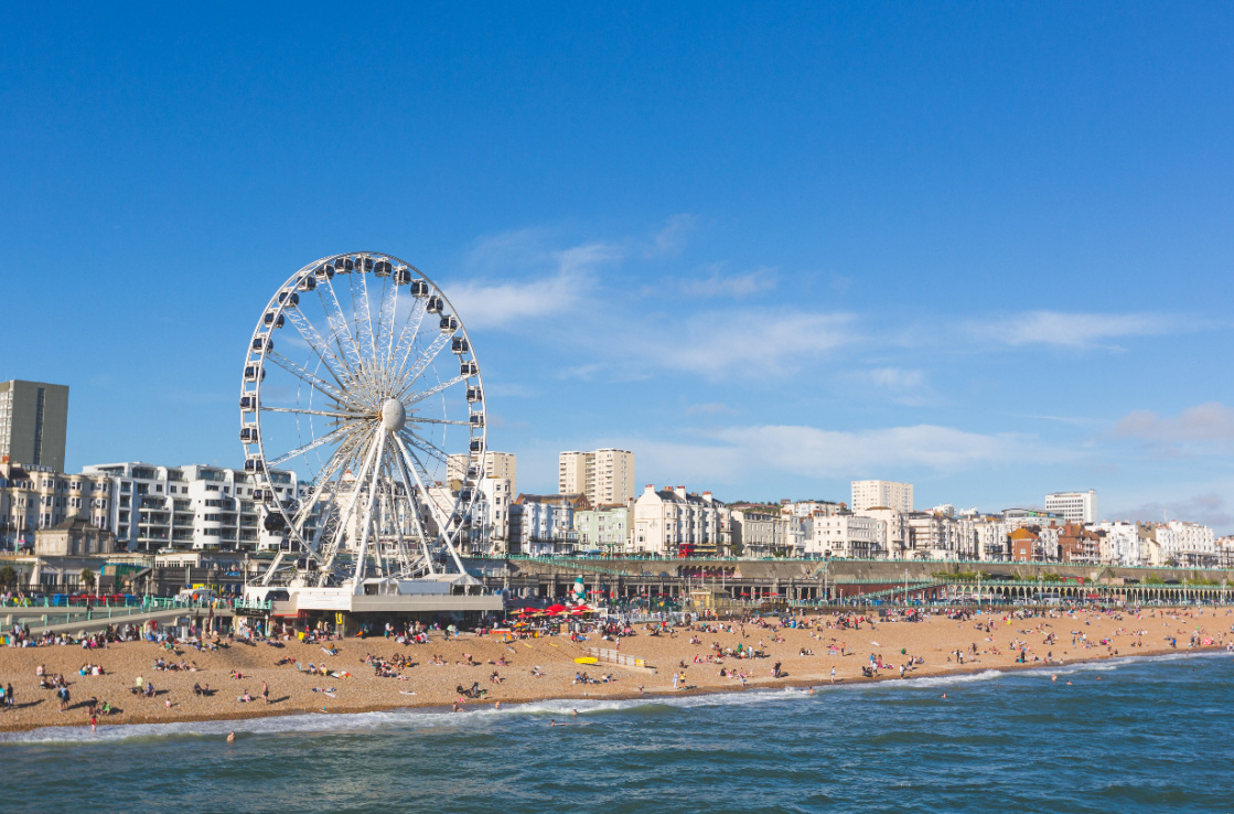 Brighton beach with a view of the ferris wheel Brighton beach with a view of the ferris wheel