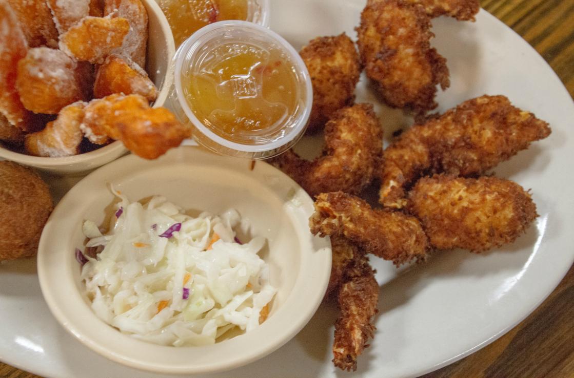 A plate of fried chicken and coleslaw