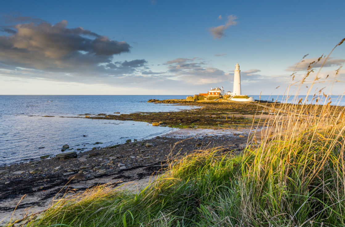 Lighthouse by the sea in the afternoon. Lighthouse by the sea in the afternoon.