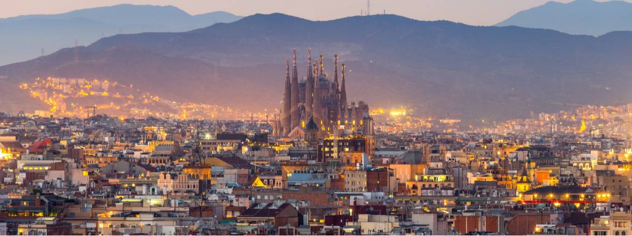 View of the Sagrada Familia in Barcelona at sundown.
