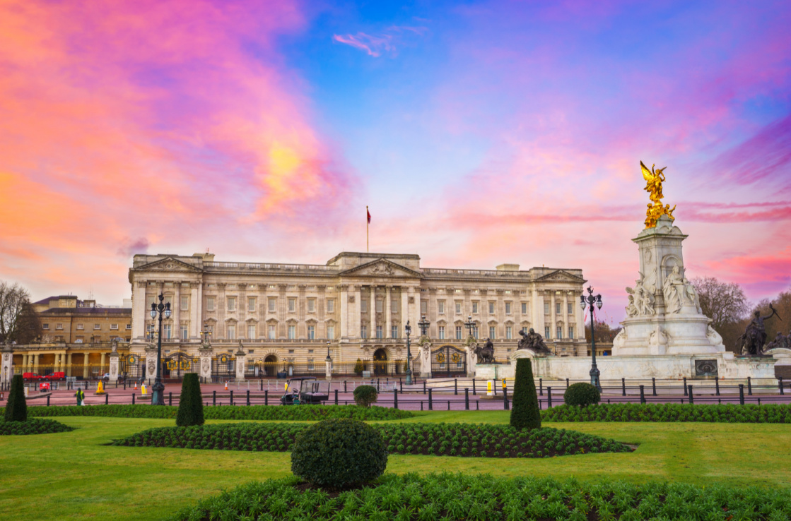 Buckingham palace under a pink and purple sky Buckingham palace under a pink and purple sky
