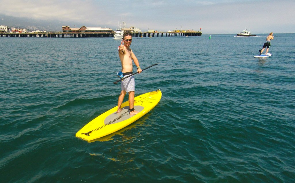 A person paddle-boarding