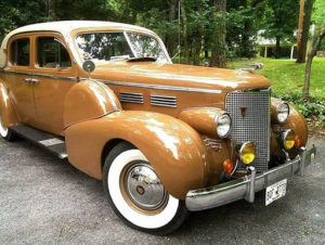 Hunter Byington kept a photo of his prized 1938 Cadillac at his place setting for every meal