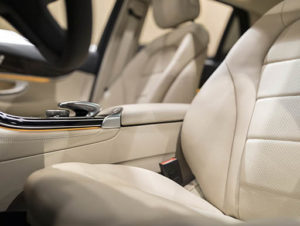 High quality comfortable ivory leather seats within a luxury car