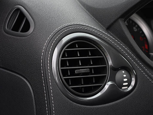 A car's air conditioning vent A car's air conditioning vent