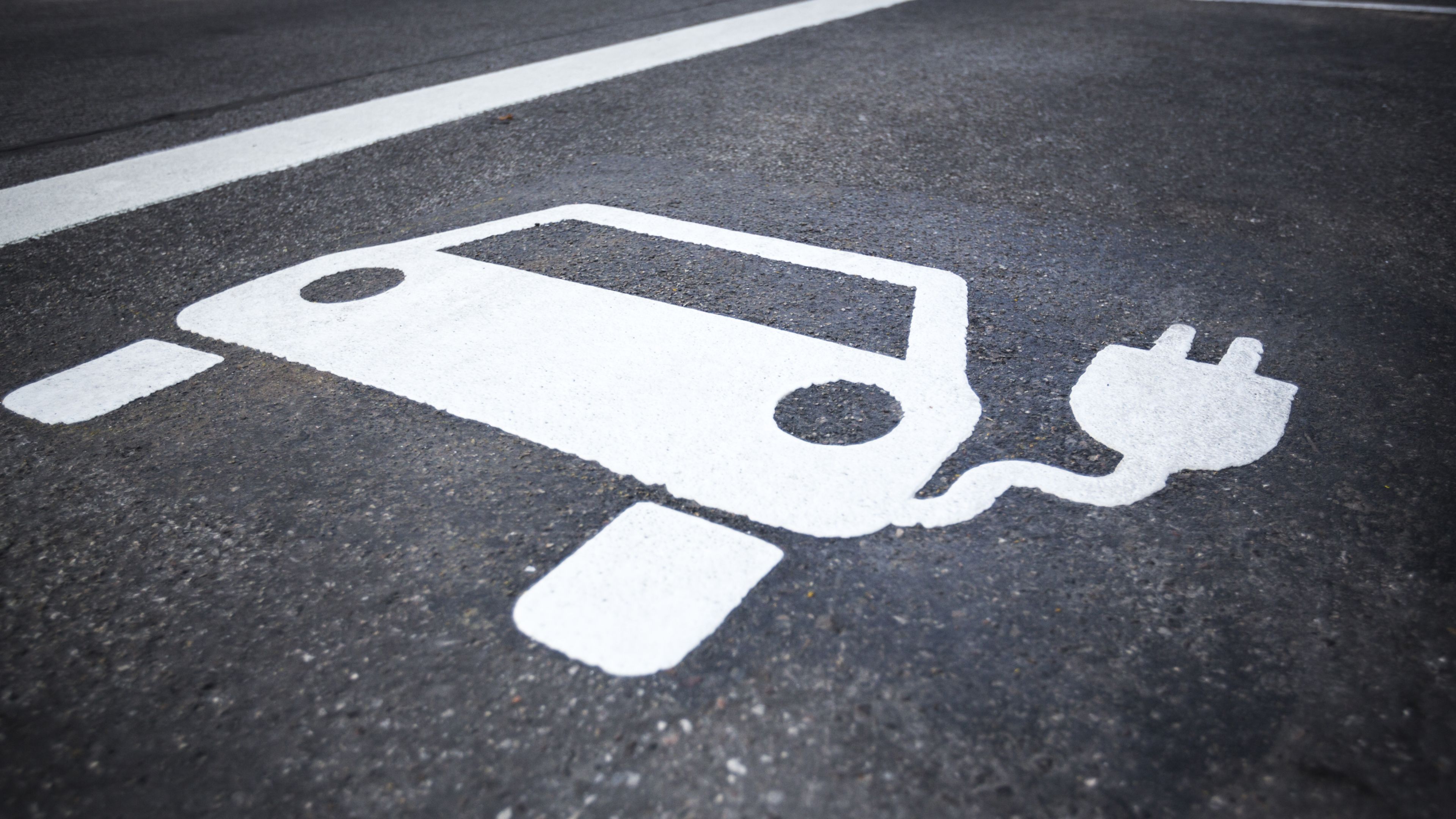 electric car symbol in road electric car symbol in road