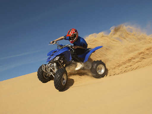 Motorcycling Through the Desert on ATVs Motorcycling Through the Desert on ATVs