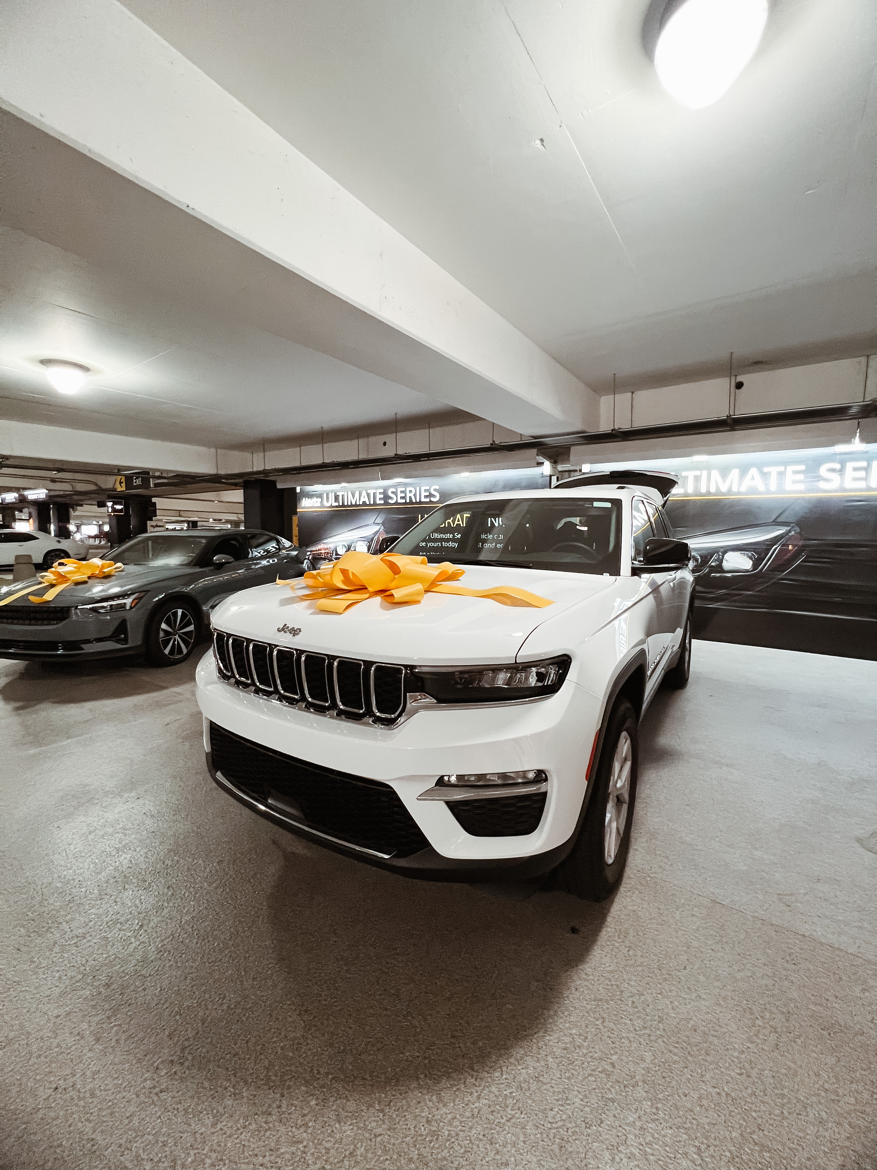 White Jeep in Hertz car rental lot CLT White Jeep in Hertz car rental lot CLT