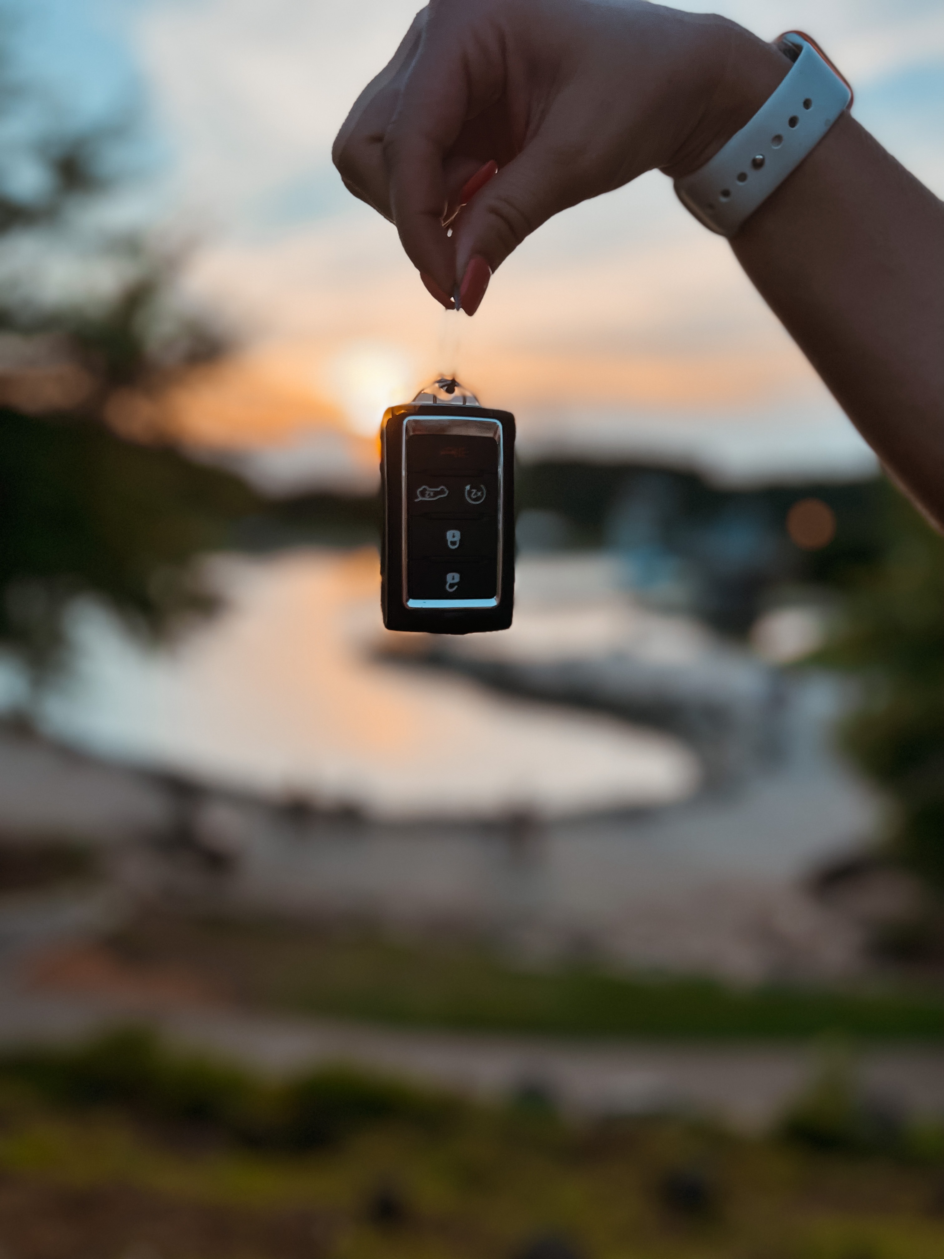 Jeep Hertz Car Rental Keys with sunset Jeep Hertz Car Rental Keys with sunset
