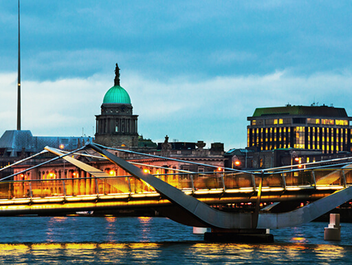 Illuminated Sean O'Casey Bridge and the Custom House Illuminated Sean O'Casey Bridge and the Custom House
