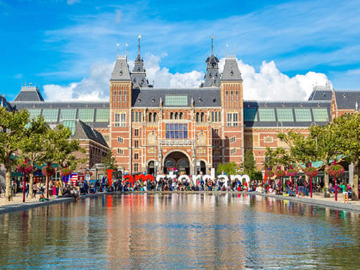 The impressive front of the Rijksmuseum and I Amsterdam Sculpture The impressive front of the Rijksmuseum and I Amsterdam Sculpture