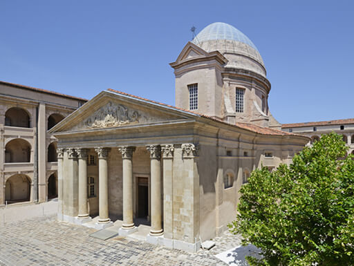 A view of the historic Vieille Charite temple in Marseille, France on a clear afternoon. A view of the historic Vieille Charite temple in Marseille, France on a clear afternoon.