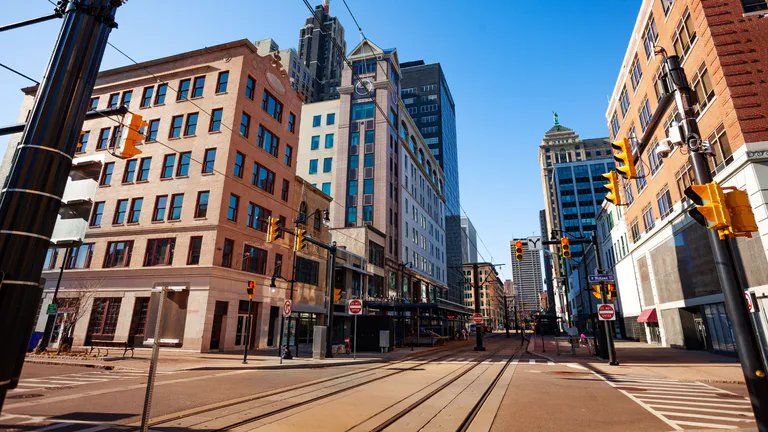 Street in Buffalo City with tram line.