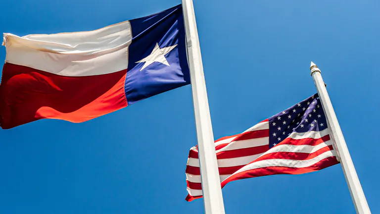Flags of Texas and the US.