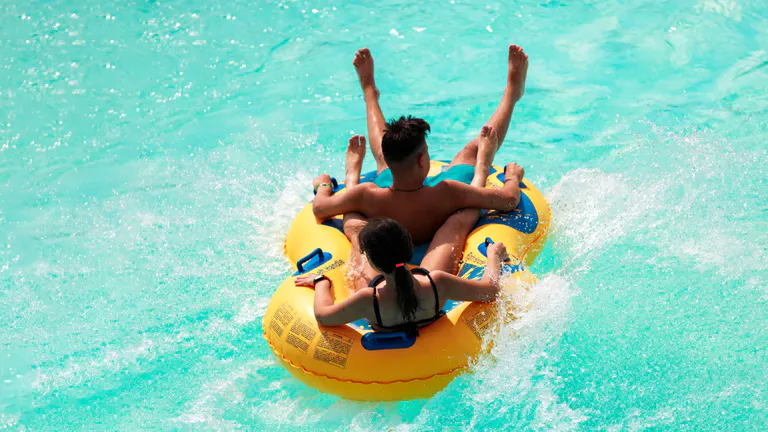 people on a water slide